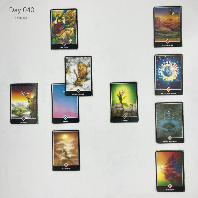 Day 040. Celtic Cross Layout of daily cards.1 is Now, card is Trust. 2 is Influence, card is Conditioning. 3 is Goal, card is The Rebel. 4 is Distant Past, card is Courage. 5 is Recent Past, card is Traveling. 6 is Future Energy, card is The Fool. 7 is Feelings, card is Intensity. 8 is Others’ views, card is Consciousness. 9 is Hopes & Fears, card is We are the World. 10 is Outcome, card is Possibilities.
